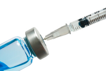 doctor's hand holds a syringe and a blue vaccine bottle at the hospital. Health and medical concepts.