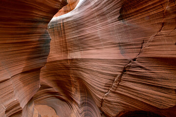Slot Canyons, commonly found in arid areas such as Utah, Arizona and southwest USA are formed by water erosion typically in sandstone and are at risk of flash flooding