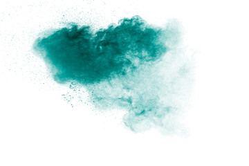 Green powder explosion on white background.