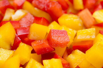 chopped  yellow and red  bell pepper closeup selective focus