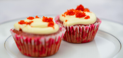 cupcakes with cream and strawberry