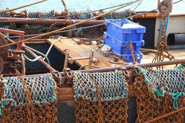 Clam or scallop drag nets on a fishing boat in Weymouth, Dorset, England