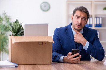 Young man being fired from his work