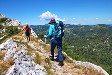 Fototapeta premium Senior couple hiking in Velebit mountain, Croatia