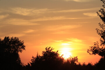 Kansas colorful Sunset  with a bright and colorful sky with tree silhouette's.