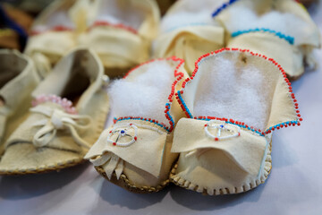Handmade leather Native American Indian moccasins at a powwow in San Francisco