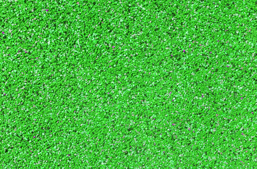 Fototapeta premium Background texture of small pebbles of green color.