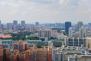Architectural panoramic shot of Toa Payoh central skyline on a sunny day. Greenery is interspersed...