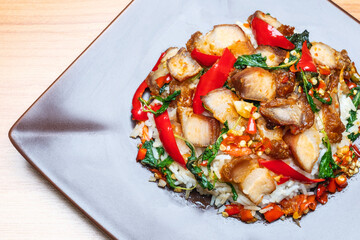Stir fried crispy pork basil with rice
