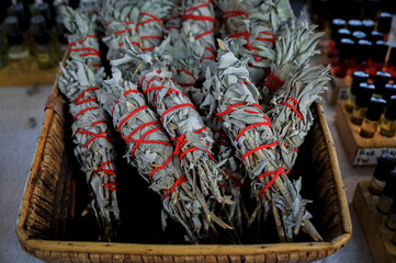 Traditional Native American Indian ritual white sage smudge sticks for sale at a powwow, San Francisco