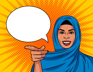 Colored vector illustration in pop art comic style. Beautiful Muslim woman in a traditional shawl on her head. The girl points her finger at you. The woman gestures to you. Arab woman smiling.