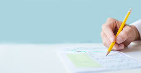 high school,university student study.hands holding pencil writing paper answer sheet.sitting...