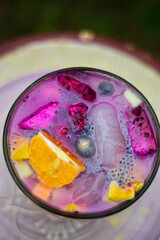 Close up Fruit Soup, fresh fruit mixed with milk, ice and fresh syrup to relax. Top view