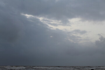 Obraz na płótnie Canvas stormy clouds over the sea
