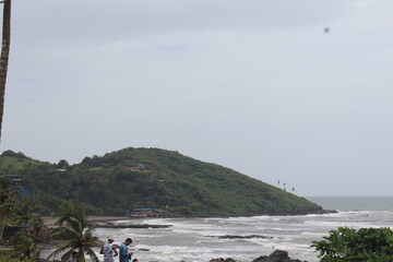 people walking on the beach