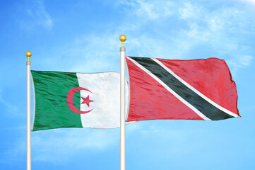 Naklejka na ściany i meble Algeria and Trinidad and Tobago two flags on flagpoles and blue sky