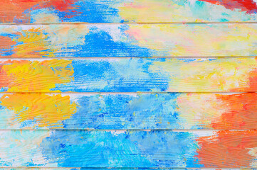 Fototapeta na wymiar Abstract colorful paint on textured wooden wall,paint background