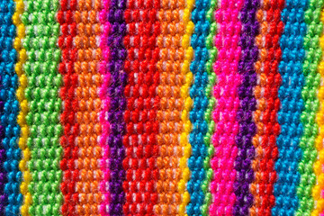 close up of colorful wool with vibrant colors woven