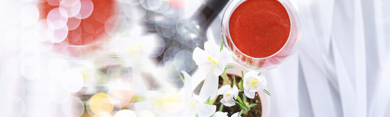 Glass with grape red semi-dry wine. Valentine's day concept background. Gift for the holiday. Sweet sparkling wine.