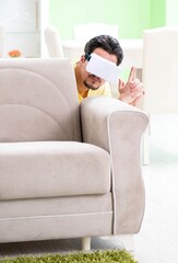 Young man with virtual reality goggles