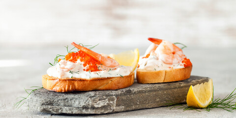 Toast skagen - shrimp and caviar on toast. Classic swedish appetizer. Selective focus. Copy space