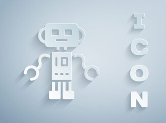 Paper cut Robot toy icon isolated on grey background. Paper art style. Vector.