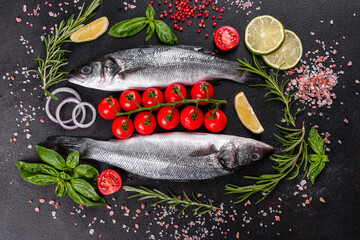 Fresh fish seabass and ingredients for cooking. Raw fish seabass