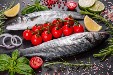 Fresh fish seabass and ingredients for cooking. Raw fish seabass