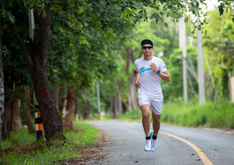 Asian men jogging and running in the park