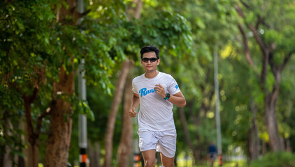 Asian men jogging and running in the park