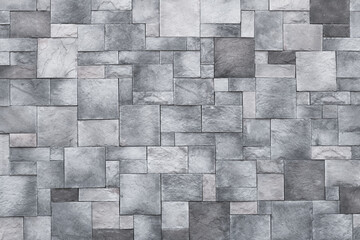 Squares background, stone wall texture, gray rock floor. Monochrome granite, brick surface. Architectural design concept.