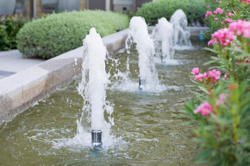    Blur,Fountain, the fluid motion of splash of water at artificial splashing fountain from the...