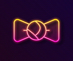 Glowing neon line Bow tie icon isolated on black background. Vector.