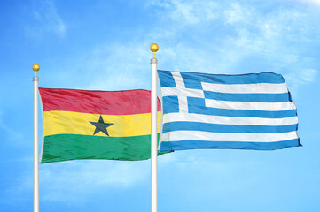 Ghana and Greece two flags on flagpoles and blue sky