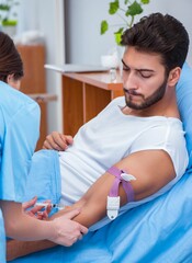 Fototapeta premium Woman doctor examining male patient in hospital