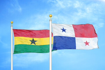Ghana and Panama two flags on flagpoles and blue sky