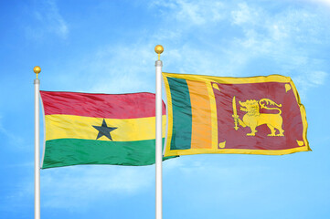 Ghana and Sri Lanka two flags on flagpoles and blue sky