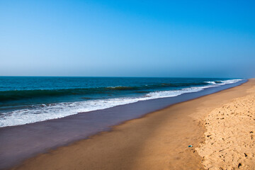 Beautiful Goa Sea beach and water waves at the time of Sunset.