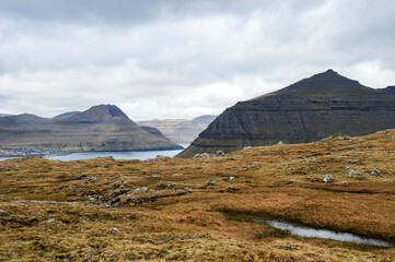 Obraz premium Amazing view in Faroe Islands (Denmark, Europe). Beautiful Panoramic Scene Of Nordic Islands