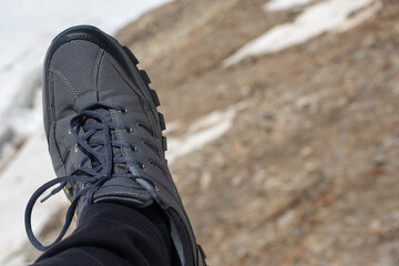 One trekking Footwear for mountain sport, on the chairlift
