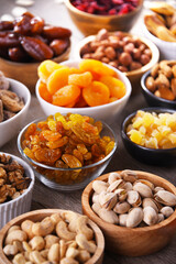 Composition with dried fruits and assorted nuts. Delicacies