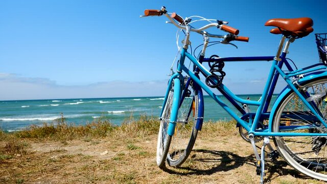 two bicycle on the beach