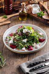 Healthy vitamin salad with beetroot cheese greens
