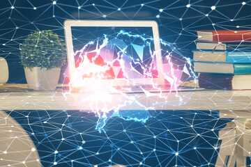 Double exposure of work space with computer and human brain drawing hologram. Brainstorm concept.