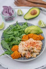 healthy home made avocado hummus salad bowl