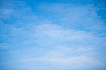 clear blue sky on a summer day with light cirrus clouds