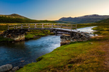 Fototapeta na wymiar landscape with river and mountains - Rondane National park, Norway