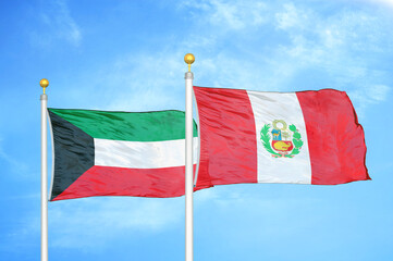 Naklejka na ściany i meble Kuwait and Peru two flags on flagpoles and blue sky