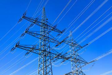 electric pylon under clear blue sky