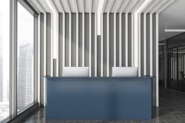 Grey reception table in wooden office